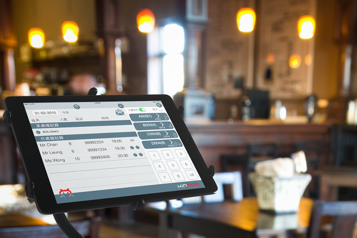 POS terminal in coffee cafe with software interface to take order and print receipt.