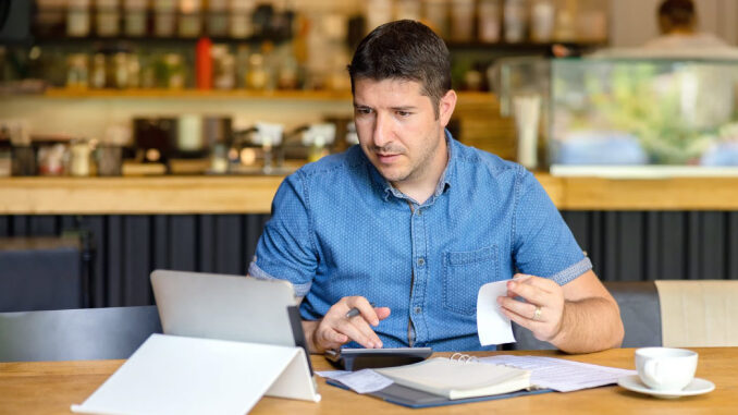 An image of an accounting professional in a restaurant